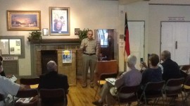 Jones addresses Wilmington Rotary club members on "vocational day" at the Hannah Block Historic USO/Community Arts Center, Wilmington. 2013.